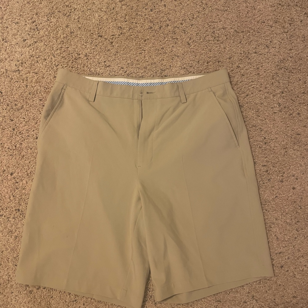 Lightly used kaki footjoy shorts . 36 waist